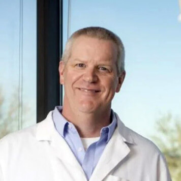 Portrait photo of doctor Daren Carlile, a dentist in Columbine, CO